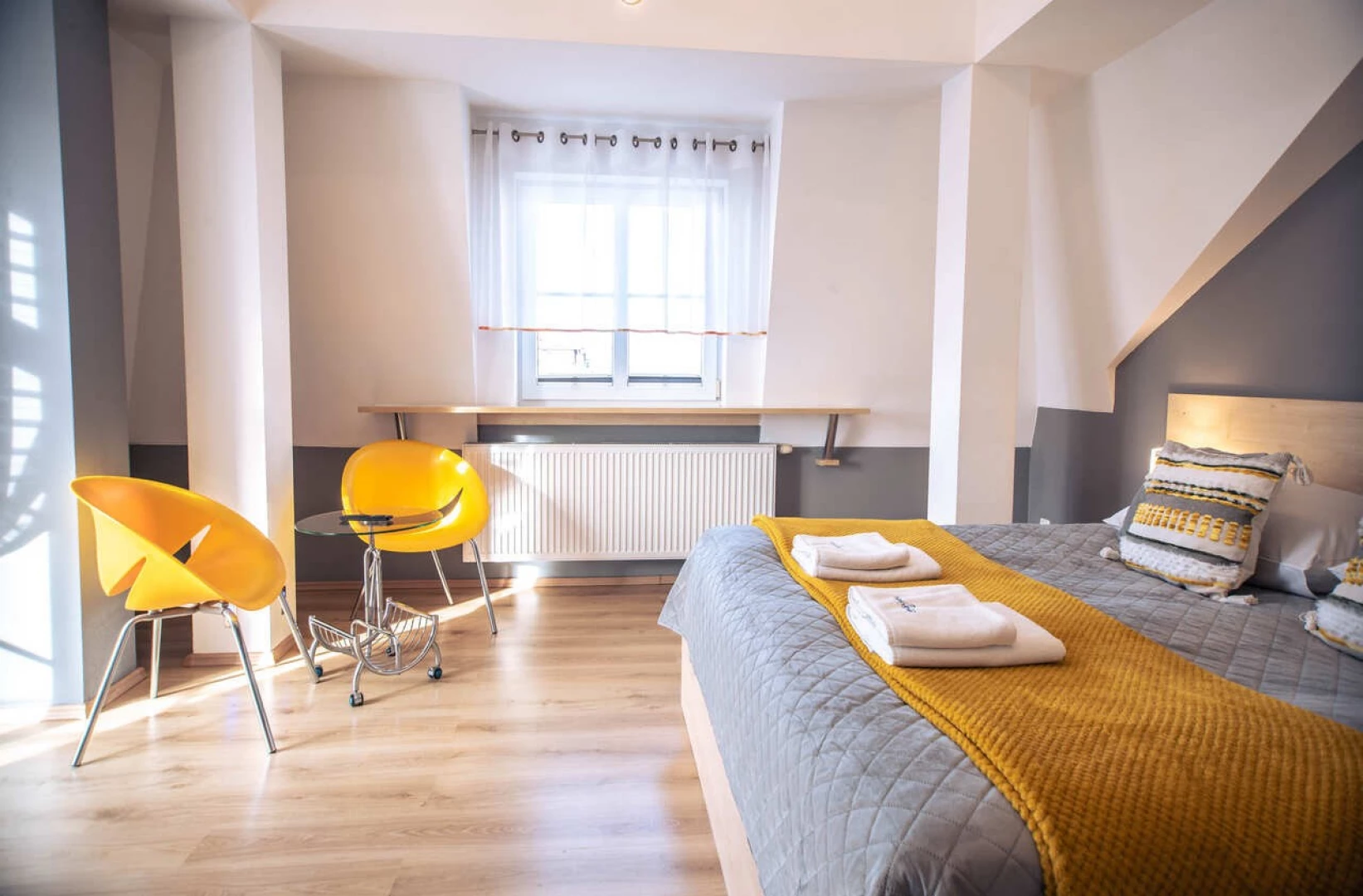 Ferienwohnung Drei Kronen Swinemünde 53 – Schlafzimmer mit Sessel